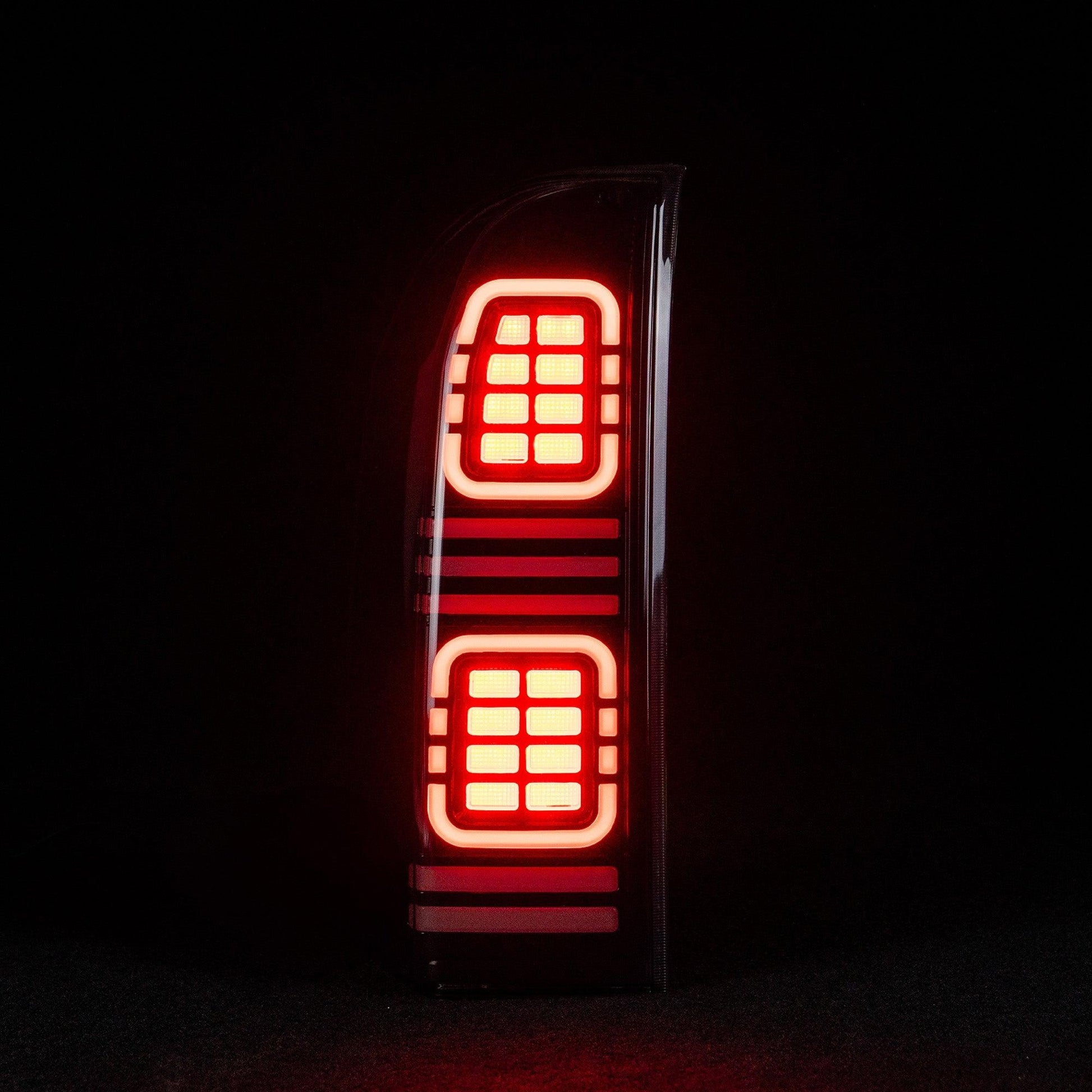 Blacked Out LED Tail Light glowing red
