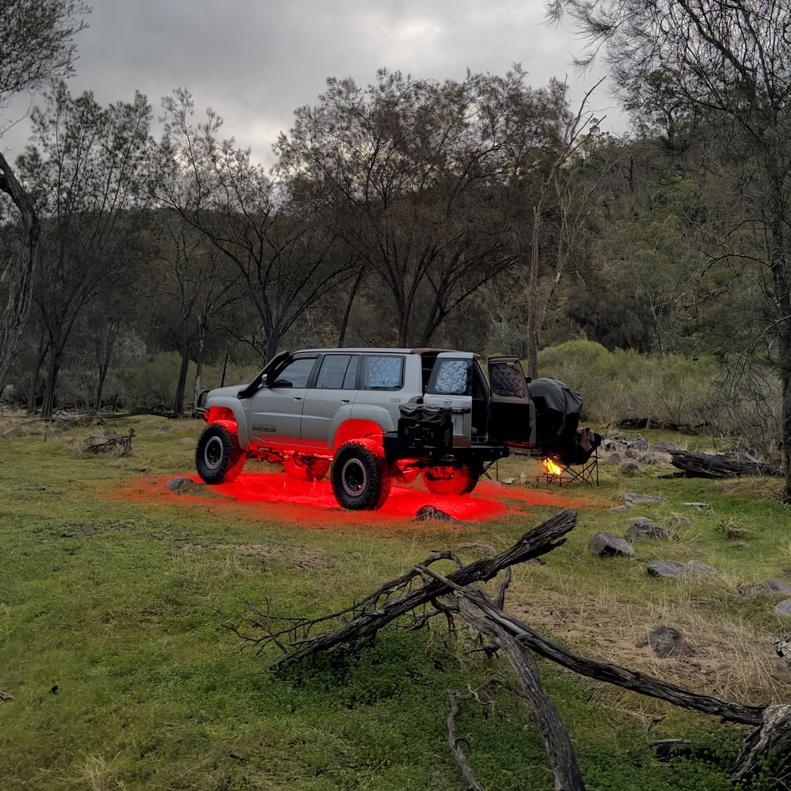 GENSET GU Patrol with CX6 rock light underglow at camp
