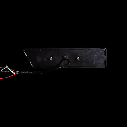 Back of Universal LED Tray Tail Light showing flat flange, two mounting studs and wiring lead - Bushdoof Lighting